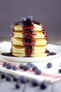 Blueberry Maple Syrup - Dress up your pancakes with this sweet and sticky recipe with fresh blueberries and an added hint of the traditional maple flavor. Mmmm. Super yummy breakfast idea!