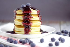 Blueberry Maple Syrup - Dress up your pancakes with this sweet and sticky recipe with fresh blueberries and an added hint of the traditional maple flavor.  Mmmm. Super yummy breakfast idea!