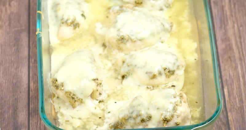 Cheesy Garlic Herb Chicken - easy and cheesy baked chicken dinner recipe with lots of herbs and garlic, and best of all gooey CHEESE!