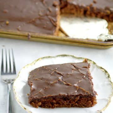 Chocolate Texas Sheet Cake Recipe - An easy homemade chocolate cake recipe from scratch. This cake is THE BEST! Rich, chocolate, and moist! The richest, most delicious chocolate cake on the PLANET with moist chocolate cake and a decadent fudge frosting. An absolute must-try for chocolate lovers!