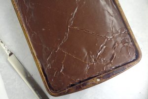 Chocolate Texas Sheet Cake  Recipe -  An easy homemade chocolate cake recipe from scratch.  This cake is THE BEST! Rich, chocolate, and moist!  The richest, most delicious chocolate cake on the PLANET with moist chocolate cake and a decadent fudge frosting. An absolute must-try for chocolate lovers!