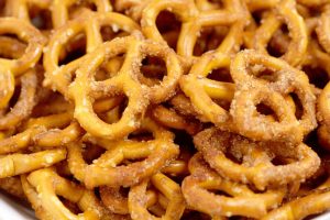 Cinnamon Sugar Pretzels Recipe- salty pretzels baked in butter, cinnamon, and sugar. A super yummy appetizer and snack recipe, great for a party, the holidays, or just because! The perfect combination of sweet and salty! 