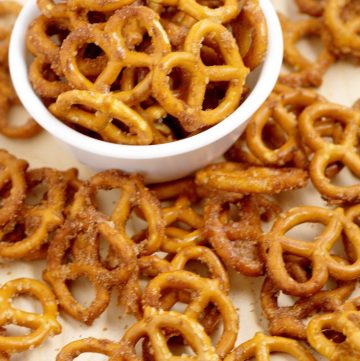 Cinnamon Sugar Pretzels Recipe- salty pretzels baked in butter, cinnamon, and sugar. A super yummy appetizer and snack recipe, great for a party, the holidays, or just because! The perfect combination of sweet and salty!