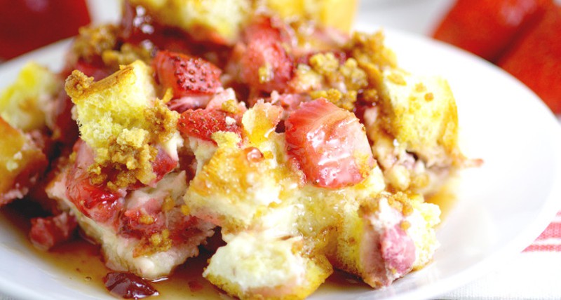 Have cheesecake for breakfast with Strawberry Cream Cheese French Toast Bake! Filled with fresh strawberries, creamy cheesecake spread, and a graham cracker topping! A delicious overnight, make ahead breakfast casserole recipe that's great for the holidays, Christmas, and busy mornings!