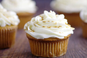 Ginger Brown Sugar Cupcakes with Spiced Cream Cheese Icing- A homemade delightful twist on traditional carrot cake and spice cake cupcakes recipe from scratch. A great dessert for Fall gatherings! Loooove the spiced cream cheese frosting!