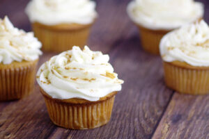 Ginger Brown Sugar Cupcakes with Spiced Cream Cheese Icing- A homemade delightful twist on traditional carrot cake and spice cake cupcakes recipe from scratch. A great dessert for Fall gatherings! Loooove the spiced cream cheese frosting!