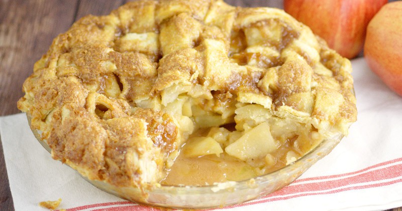 Traditional Apple Pie recipe that won't disappoint. Homemade apple pie with a classic sweet apple pie filling in a flaky pie crust topped with a glaze makes this pie unforgettable.  This recipe is seriously the best!