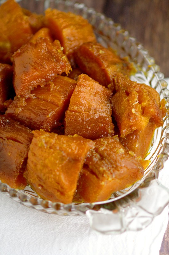 Classic Candied Sweet Potatoes baked in butter and sweet brown sugar are a sweet and delightful side dishes recipe for your Thanksgiving table. Plus they're super simple and easy to make. I LOVE these! They're my favorite part of Thanksgiving!