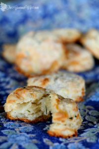 Brie and Chive Biscuits Recipe - Easy homemade buttermilk biscuits with brie and chives. It's so easy to make these amazing, flaky biscuits from scratch! These would be a perfect Thanksgiving side dish. Look how flaky they are!