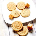 These Caramel Swirl Cookies are a wonderful combination of a soft, chewy cookie swirled with sweet, creamy caramel. Unique and delicious caramel cream pinwheel cookie recipe from scratch. Also would make a great Christmas Cookies recipe. THE BEST for caramel lovers everywhere.
