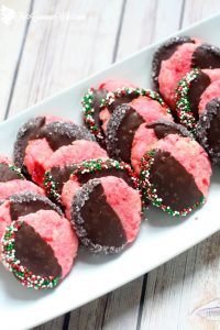 White Chocolate Cherry Shortbread Cookies are a delicious combination of creamy white chocolate and sweet maraschino cherries, dipped in milk or dark chocolate. A perfect and festive Christmas Cookies recipe that's super easy too! Love maraschino cherries!