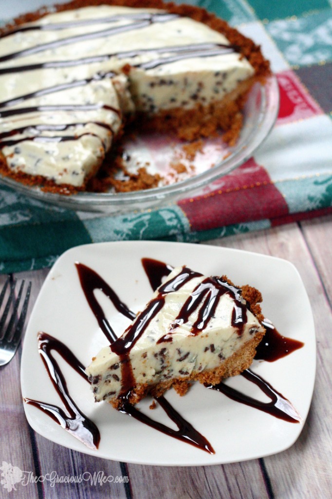 Eggnog Ice Cream Pie recipe is a heavenly and unique Christmas dessert with an easy graham cracker crust and homemade eggnog ice cream with mint chocolate chunks.  All Christmas recipes should have eggnog, especially desserts! So yummy!