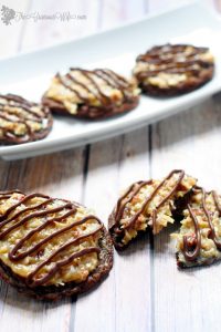 These German Chocolate Cookies are a delicious combination of chocolate cookies and German Chocolate Coconut Pecan Frosting. A recipe during our Week of Christmas Cookies Recipes. From TheGraciousWife.com #Christmas #Cookies