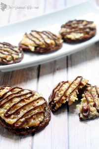 German Chocolate Cake Cookies Recipe -  a delicious combination of sweet and decadent chocolate cookies and gooey caramel coconut pecan frosting make these cookies as amazing as the cake that they were inspired by. Perfect for the holidays! A yummy addition to your Christmas cookies exchange too! So good! 