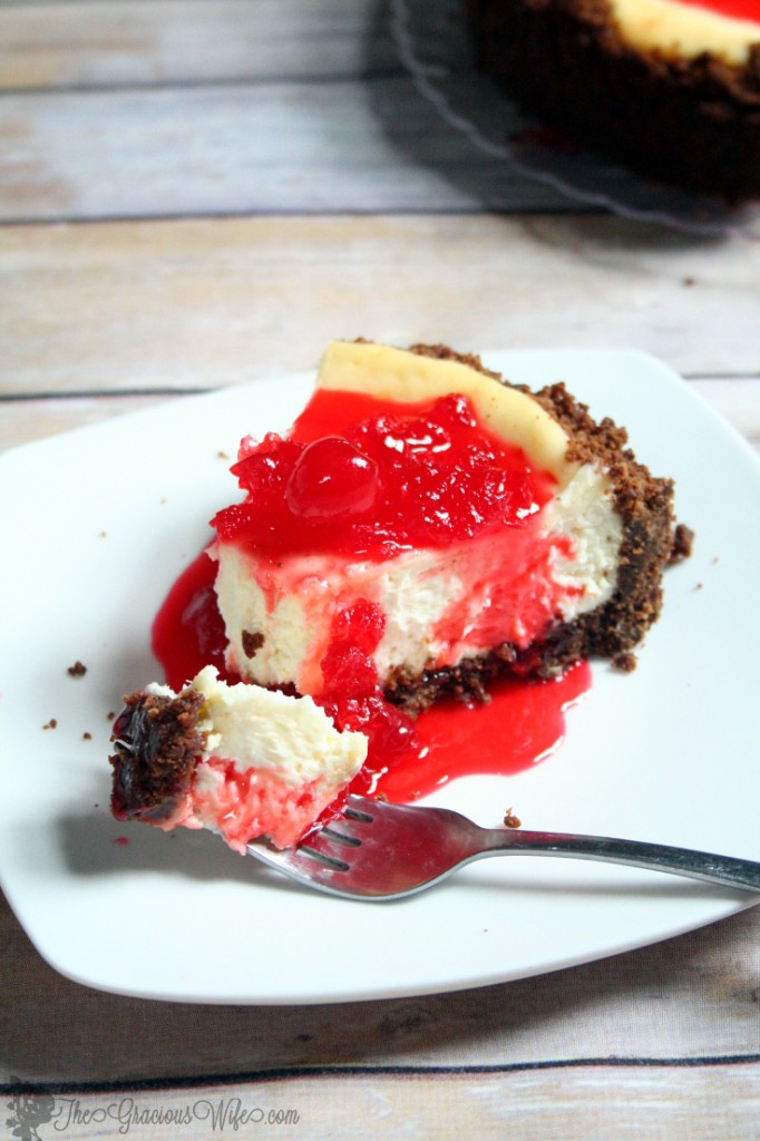 Gingersnap Cherry Cheesecake recipe has a buttery gingersnap crumb crust, classic and creamy cheesecake filling, and a sweet cherry sauce topping, perfect for the holidays.  What a beautiful Christmas dessert recipe idea! I looove the sweet maraschino cherry sauce!
