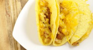 Chorizo Potato Tacos are a quick and easy dinner recipe idea that only takes 30 minutes to make! Crispy potatoes and salty, spicy chorizo are topped with a crisp black bean and cilantro salsa to make a delicious but frugal dinner.