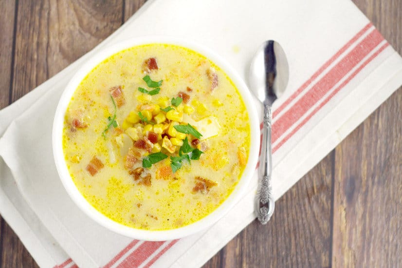 Hearty, cozy, creamy soup recipe, Southern Corn Chowder with potato, bacon, cheese, vegetables, and of course, lots of corn, will warm you up on those chilly days. Fresh, frozen, or canned corn all work for this delightful warm soup recipe. Serve with warm, buttery, crusty bread.