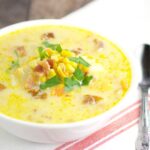 Hearty, cozy, creamy soup recipe, Southern Corn Chowder with potato, bacon, cheese, vegetables, and of course, lots of corn, will warm you up on those chilly days. Fresh, frozen, or canned corn all work for this delightful warm soup recipe. Serve with warm, buttery, crusty bread.