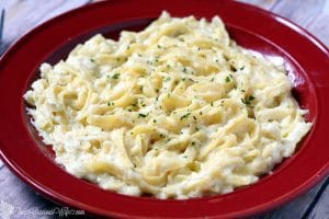 Authentic Fettuccine Alfredo Recipe is a heavenly, easy and quick pasta dinner idea combination of butter, cream, and Parmesan to make a smooth creamy REAL Alfredo sauce recipe. That's it! Super quick and easy dinner! Also great with added garlic and chicken! One of my absolute all-time favorites! Sooo delicious!