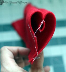 Valentine's Day Heart Felt Garland- Easy and frugal DIY heart felt garland for Valentine's Day. From TheGraciousWife.com