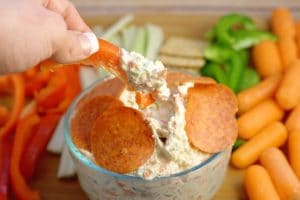 Italian Veggie Dip Recipe - an easy cold dip recipe with cream cheese.  Italian Veggie Dip is a cool, creamy, and fresh Italian veggie dip packed with pepperoni, cheese, and lots of flavor. Serve with an assortment of colorful veggies. This is so amazing with fresh vegetables or crackers! Perfect for a party!