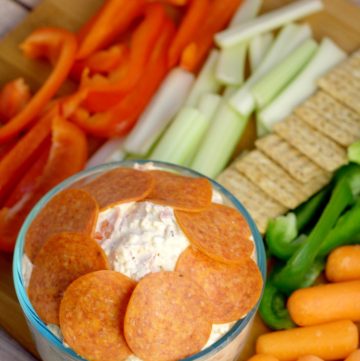 Italian Veggie Dip Recipe - an easy cold dip recipe with cream cheese.  Italian Veggie Dip is a cool, creamy, and fresh Italian veggie dip packed with pepperoni, cheese, and lots of flavor. Serve with an assortment of colorful veggies. This is so amazing with fresh vegetables or crackers! Perfect for a party!