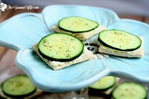 Cucumber Sandwiches Recipe- Perfect for a quick and easy snack or appetizer recipe. Creamy ranch spread and crisp, fresh cucumbers with dill on thin bread squares make a simple but delicious appetizer. These are my favorite!  I love these for a party or shower! 