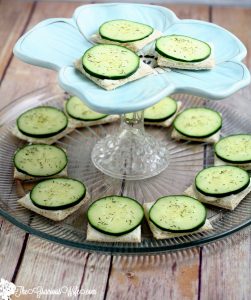 Cucumber Sandwiches Recipe- Perfect for a quick and easy snack or appetizer recipe. Creamy ranch spread and crisp, fresh cucumbers with dill on thin bread squares make a simple but delicious appetizer. These are my favorite!  I love these for a party or shower! 