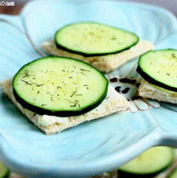 Cucumber Sandwiches Recipe- Perfect for a snack or appetizer. Bread squares with cream cheese, ranch, cucumbers and dill. #cucumbers #appetizers #teasandwiches #sandwiches From TheGraciousWife.com