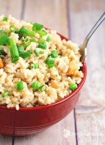 Learn how to make homemade Fried Rice at home with this easy copycat Fried Rice Recipe. As good as the real restaurants! Great for an easy rice side dish recipe!