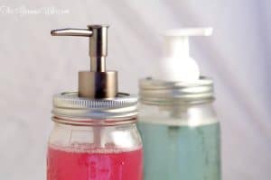 Image shows to mason jars turned into soap dispensers