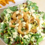 Southwest Salad Recipe with Spicy Honey Mustard Dressing Recipe - an easy salad recipe that's perfect for lunch or dinner. Onion Rings on a salad?! Yes, please!