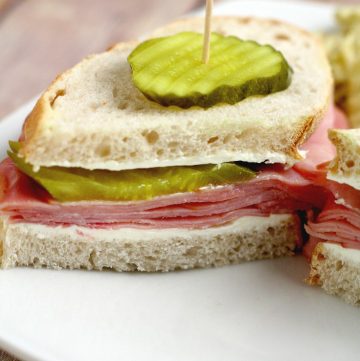 Dill Pickle Ham Sandwiches are a spin-off of the ham, cream cheese, and dill pickle roll up appetizers, that makes it okay to eat this tastiness every day, instead of just a holiday or party!