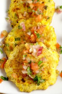 Fried Corn Cakes Recipe - Fried to perfection! What an easy vegetable summer side dish! I think it would be a great way to use up leftover corn on the cob too!