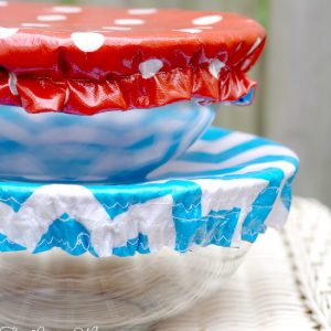 How to Make Washable Reusable Bowl Covers tutorial- a DIY sewing project perfect for summer, picnics, and cookouts. These bowl covers are washable, reusable, and even reversible. These DIY Bowl Covers are so cute! Definitely making them for our potlucks!