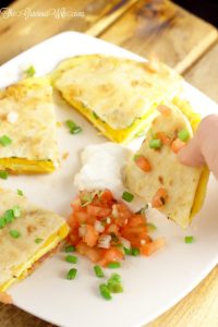 Breakfast Quesadillas Recipe - an easy and quick breakfast recipe with eggs, cheese, and bacon. So delicious and great for kids!