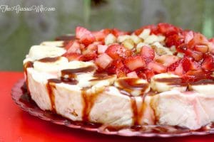 Banana Split Ice Cream Pie Recipe - a no bake pie recipe with graham pie crust, banana swirl ice cream, topped with pineapple, strawberries, chocolate sauce, whipped cream, and of course a cherry! This is so good.  It's seriously the perfect summer treat.