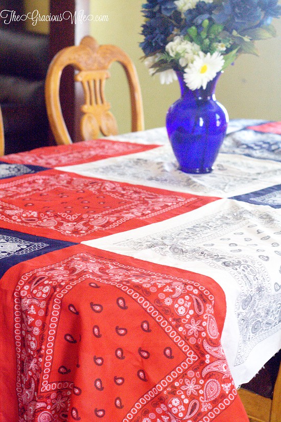 How to Make an Easy DIY Bandana Tablecloth - This easy patriotic red, white, and blue DIY Bandana Tablecloth is a fun and frugal Summer and 4th of July patriotic idea, with a full tutorial. So cute and festive!