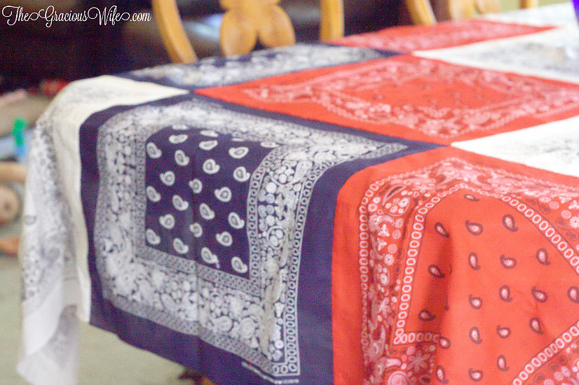 How to Make an Easy DIY Bandana Tablecloth - This easy patriotic red, white, and blue DIY Bandana Tablecloth is a fun and frugal Summer and 4th of July patriotic idea, with a full tutorial. So cute and festive!