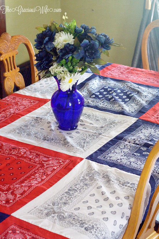 How to Make an Easy DIY Bandana Tablecloth - This easy patriotic red, white, and blue DIY Bandana Tablecloth is a fun and frugal Summer and 4th of July patriotic idea, with a full tutorial. So cute and festive!