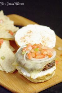 Southwest Taco Burgers Recipe - a homemade beef burger recipe with homemade taco seasoning, grilled to perfection and dressed up like a taco. So easy but amazingly delicious!