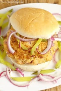 This easy Salmon Burgers recipe is a delicious burger made with salmon fillets and hints of lemon, dill, and mustard, topped with a simple pickle and red onion relish. A quick and easy healthy dinner recipe for the whole family. This relish was so good I couldn't get enough of it!