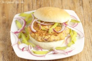 This easy Salmon Burgers recipe is a delicious burger made with salmon fillets and hints of lemon, dill, and mustard, topped with a simple pickle and red onion relish. A quick and easy healthy dinner recipe for the whole family. This relish was so good I couldn't get enough of it!
