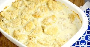 Biscuits and Gravy Casserole with homemade flaky and fluffy buttermilk biscuits smothered in rich and creamy sausage gravy for a classic family breakfast recipe or dinner recipe. Can't go wrong with a comfort food classic!