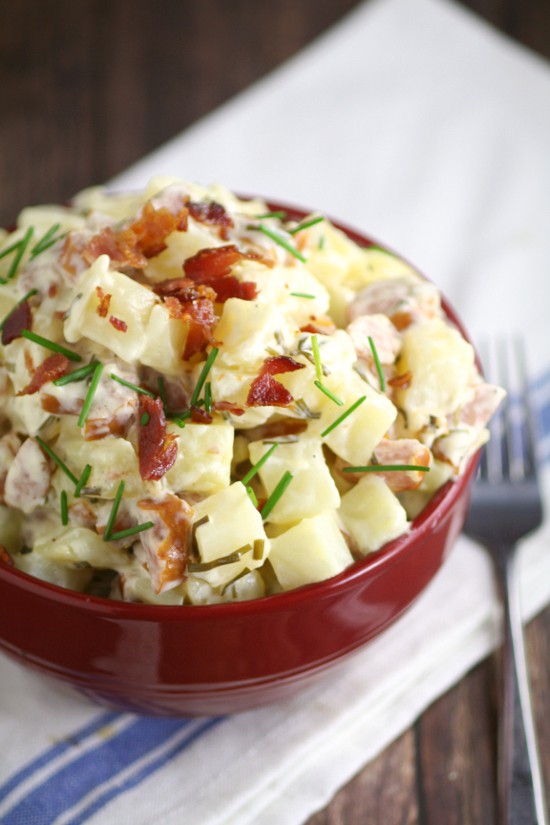 Easy Creamy Slow Cooker Potatoes with Sausage and Chives combines hearty potatoes with a creamy sauce, smoked sausage, and chives for a classic, wholesome meal. Perfect easy slow cooker meal recipe with pork sausage and potatoes. I love that it can be an easy dinner or an easy side dish!