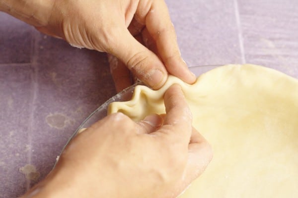 Don't be intimidated by making or Rolling Out Pie Crust any longer! This easy tutorial will show just how easy homemade pie crust can be! With a simple, step-by-step how to roll out pie crust tutorial, and an easy 3-ingredient flaky, no-fail pie crust recipe.