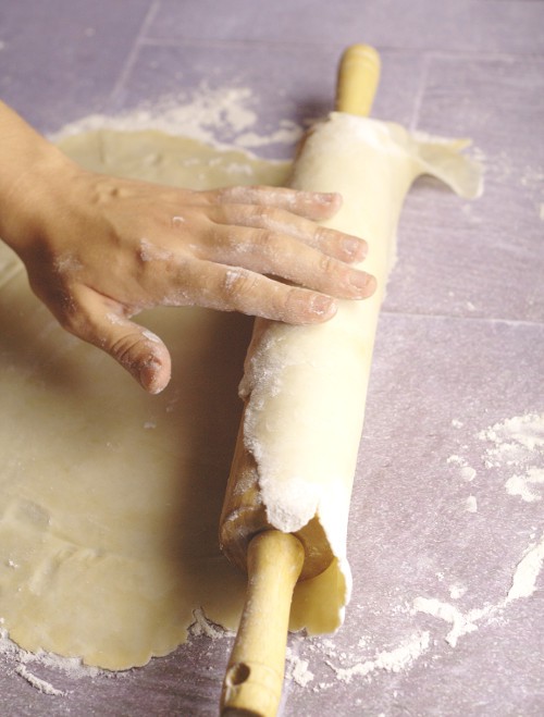 Don't be intimidated by making or Rolling Out Pie Crust any longer! This easy tutorial will show just how easy homemade pie crust can be!  With a simple, step-by-step how to roll out pie crust tutorial, and an easy 3-ingredient flaky, no-fail pie crust recipe.  