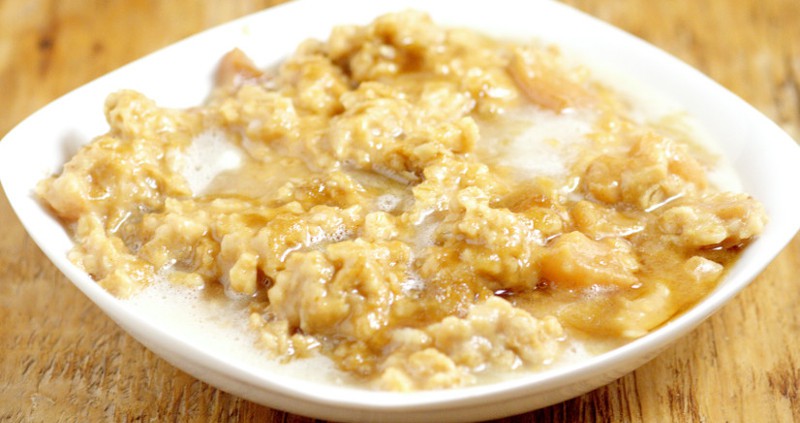 Overnight Crockpot Apple Oatmeal recipe with tangy apples, nutty oats, and sweet butter and powdered sugar glaze is a perfect overnight make ahead breakfast recipe for Fall and the holidays.