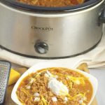 Crockpot Beef Chili made with a classic ground beef chili recipe, simmered to comfort food perfection in the slow cooker. Top with your favorites like cheese, onions, or crackers. Delicious, amazing chili, the easy way. Mmm... This looks so good!