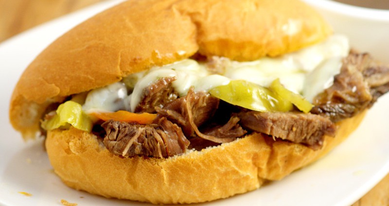 Just 5 ingredients to make your own classic, mouthwatering Crockpot Italian Beef Sandwiches recipe. Serve on French rolls with melted cheese for the full experience!  These are seriously amazing! Must try!